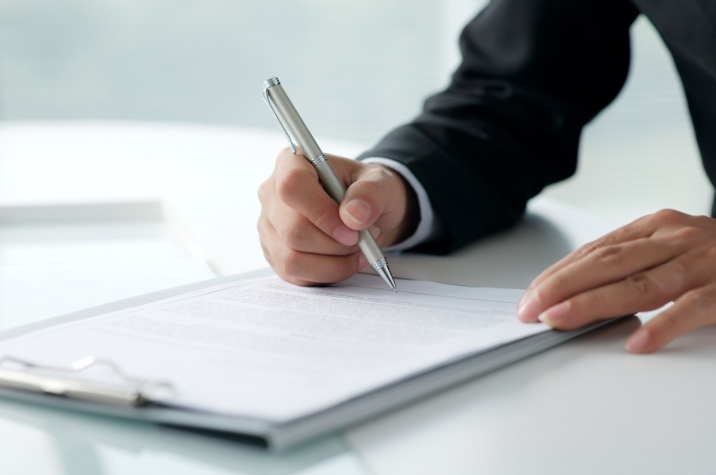 Article Ready - Image Dimension (8) Certificate of Incorporation being signed